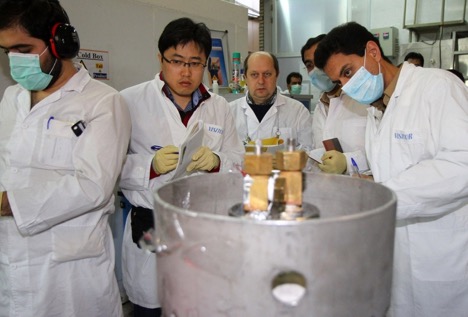 IAEA safeguard inspectors (middle left and far right) with their Iranian counterparts at the Natanz Fuel Enrichment Plant in 2014. New high-tech devices, such as online uranium enrichment monitors, could help to continuously monitor Iran’s activities around the clock. Photo courtesy of V. Fournier/IAEA.
