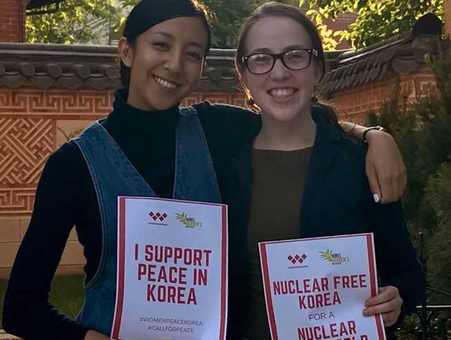 Two young women support peace in North Korea