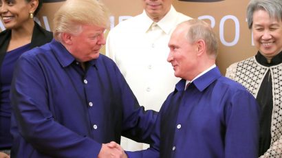 Putin and Trump shake hands at APEC meeting in Vietnam in November 2017