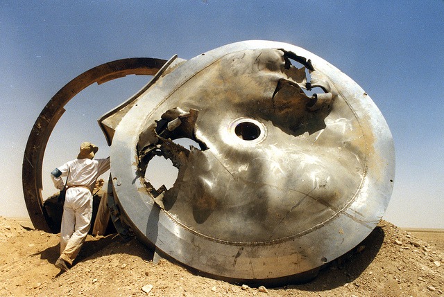 UN/IAEA inspectors examine suspect equipment in Iraq following the 1991 Gulf War. Photo Credit: IAEA Action Team