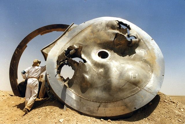UN/IAEA inspectors examine suspect equipment in Iraq following the 1991 Gulf War. Photo Credit: IAEA Action Team