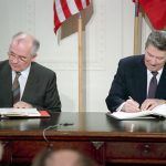 President Ronald Reagan and Soviet General Secretary Gorbachev signing the INF Treaty in the East Room of the White House on December 8, 1987.
