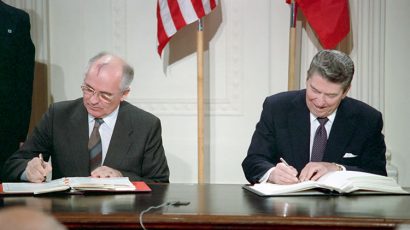 President Ronald Reagan and Soviet General Secretary Gorbachev signing the INF Treaty in the East Room of the White House on December 8, 1987.
