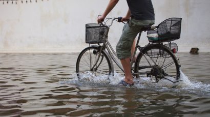 biking through floodwaters