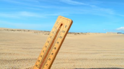 thermometer in desert sand