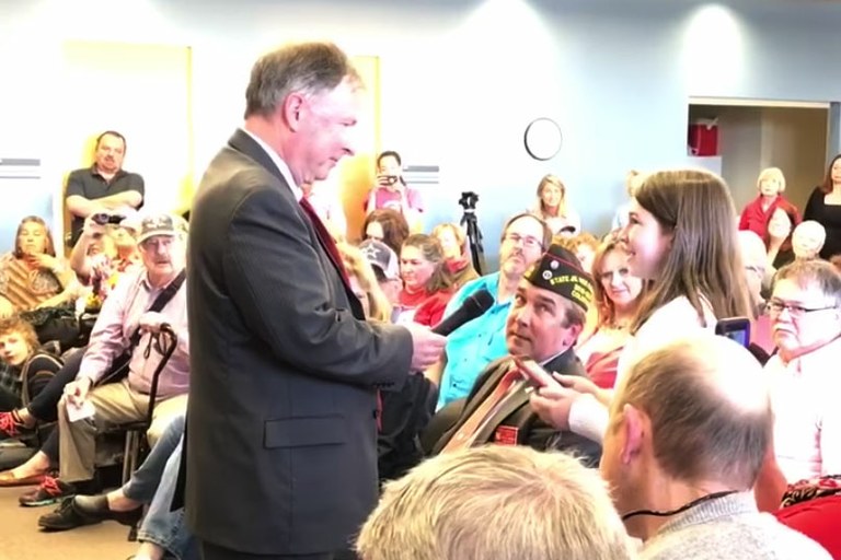 Haven Coleman questions Republican State Rep. Doug Lamborn in Colorado Springs last August. Jonathan Caughran/YouTube video capture