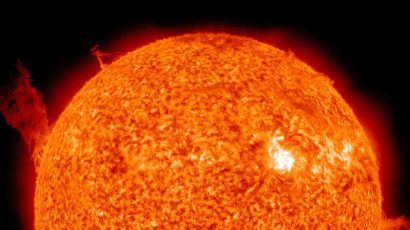 plasma swirls on orange sun