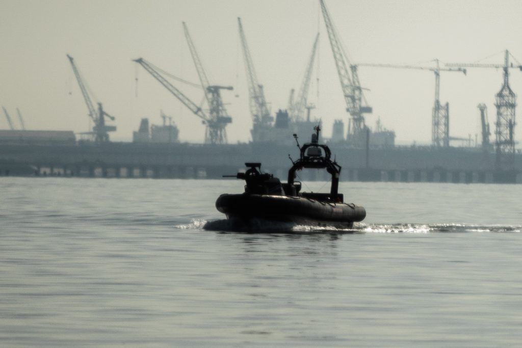 An unmanned British Royal Navy vessel patrols a harbor near Troia, Portugal, during a NATO exercise. Credit: NATO.
