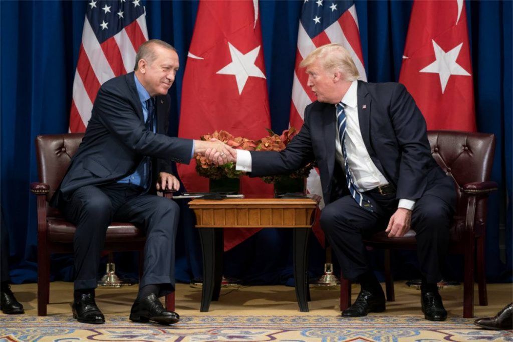 Erdogan and Trump shake hands