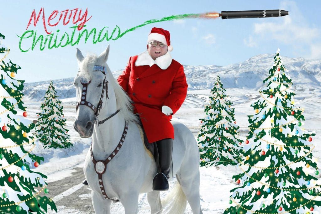 christmas illustration of north korea kim jong-un on horse as santa claus with nuclear missile
