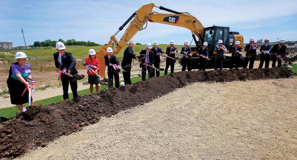Sen. Pat Roberts (center) with state, federal, and Kansas State University officials for the NBAF groundbreaking in 2015. Photo office of Sen. Pat Roberts
