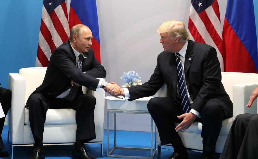 Vladimir Putin and Donald Trump at a 2017 G20 meeting in Hamburg.