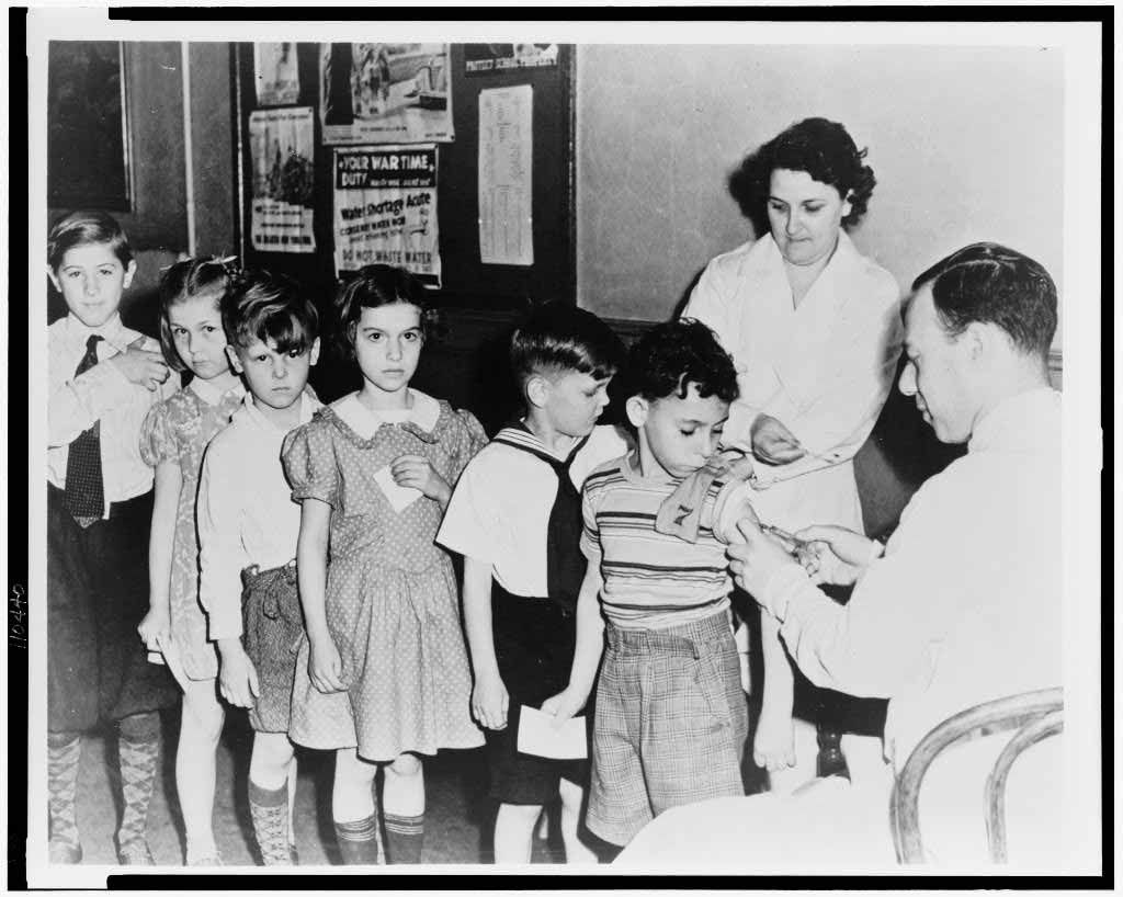 Children getting immunized at a health station in New York City.