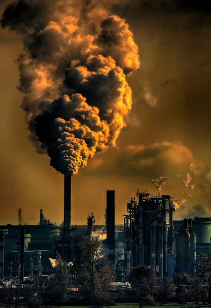 smokestacks and brown skies