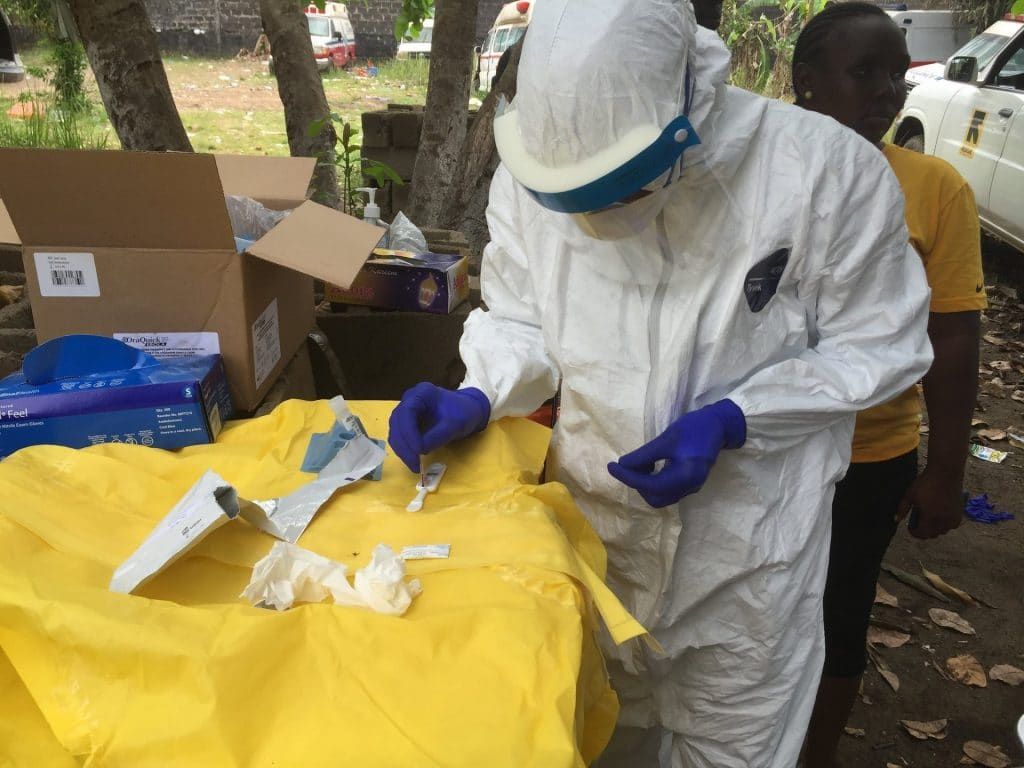 A disease detective during the 2014 Ebola outbreak in Liberia.
