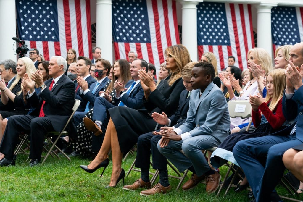 First Lady Melania Trump applauds as Judge Amy Coney Barrett delivers remarks after President Trump announced her as his Supreme Court nominee on September 26.