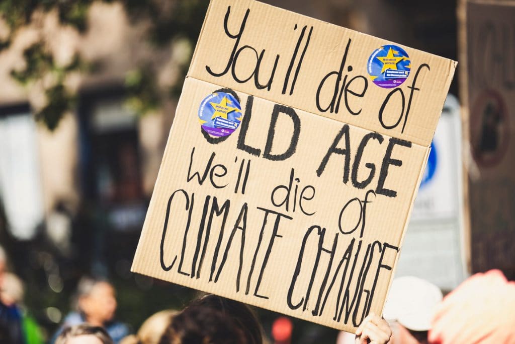 we'll die of climate change sign