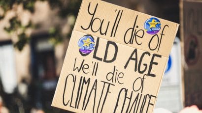 we'll die of climate change sign
