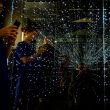Visitors check out an infinity chamber at the
