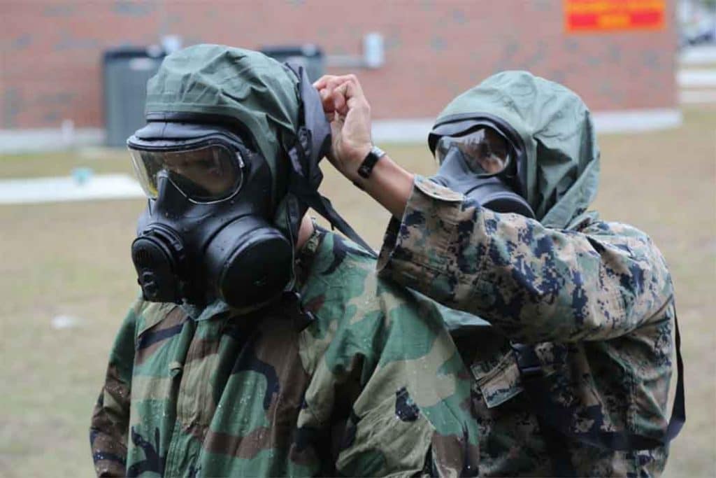 Soldiers practice responding to a chemical or biological weapons attack.