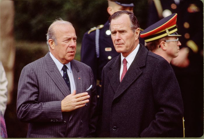 WASHINGTON, DC -- UNDATED: Secretary of State George P. Shultz (L) and Vice President George H.W. Bush at an event in Washington, DC, circa 1983. (Photo by David Hume Kennerly/Getty Images)