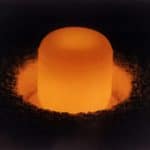 Plutonium pellet. US Energy Department public domain image via Wikimedia Commons.