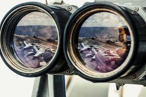 reflection of warplanes in South China Sea in binoculars