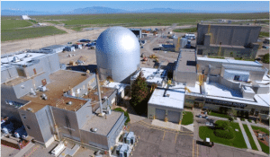 Figure 2. Idaho National Laboratory’s shutdown 62.5-thermal megawatt Experimental Breeder Reactor II surrounded by its Materials and Fuels Complex where the laboratory has been developing pyroprocessing technology for plutonium recycle. Since 2011, the Idaho National Laboratory has been hosting engineers from the Korea Atomic Energy Research Institute for joint research on pyroprocessing (Credit: Idaho National Laboratory public domain image accessed via https://mfc.inl.gov/SitePages/Home.aspx).