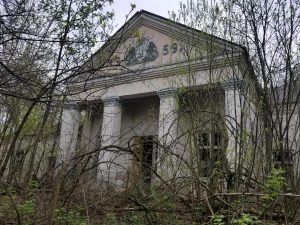 Overgrown House of Culture (a community center) at one of the abandoned villages near the Chernobyl Nuclear Power Plant. Credit: Margarita Kalinina-Pohl (2018).