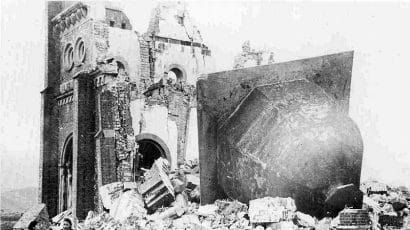 An after-picture of the Urakami Tenshudo (Catholic Church) in Nagasaki, which was destroyed in 1945 by the fission of about one kilogram of plutonium. Credit: Public domain image accessed via Wikimedia Commons.