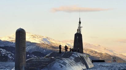 Nuclear submarine HMS Vanguard arrives back at HM Naval Base Clyde, Faslane, Scotland following a patrol. Photo: CPOA(Phot) Tam McDonald/MOD accessed via Wikimedia Commons. Open Government License version 1.0.