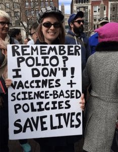 sign at Boston science rally