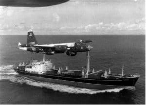 A US Navy plane shadowing a Soviet freighter during the 1962 Cuban Missile Crisis. Public Domain image courtesy of US Navy.