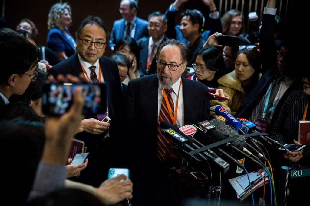 This picture, taken on November 27, 2018, shows biologist and summit chair David Baltimore (center right) of the California Institute of Technology speaking at a press conference during the Second International Summit on Human Genome Editing in Hong Kong. (Getty Images/AFP)