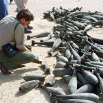 chemical-filled Iraqi mortar shells being scanned for leaks