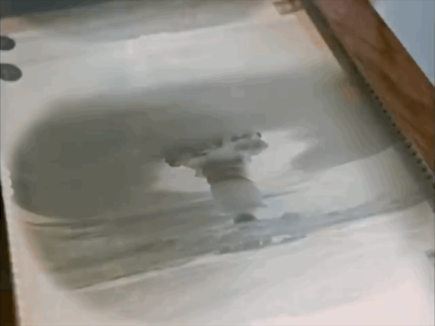 Footage from the Tsar Bomba documentary footage released in August 2020, showing photo frames of the detonation examined by Soviet military officers.