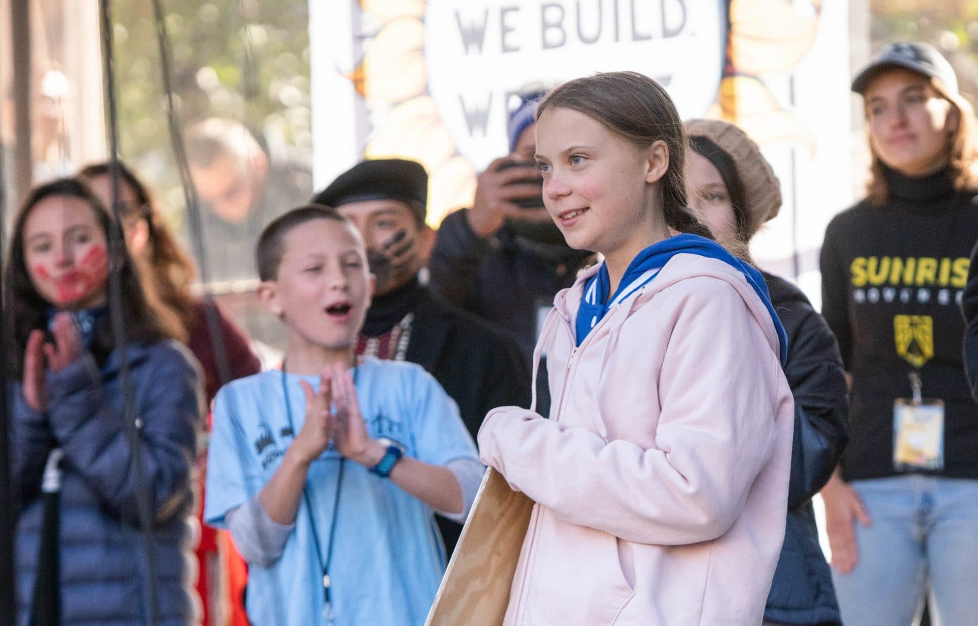 greta thunberg and children at climate rally