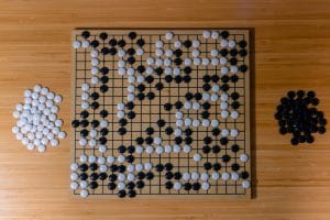 The ancient Chinese game of go. Photo credit: Marco Rubens. Used with permission.