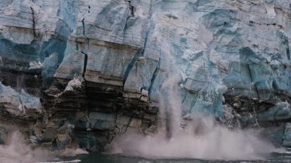 Part of a glaciar breaks off into the ocean