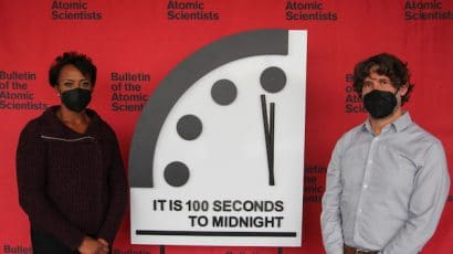 Suzet McKinney, member of the Bulletin of the Atomic Scientists' Science and Security Board (SASB), and Daniel Holz, 2022 co-chair of the Bulletin's SASB, reveal the 2022 time on the Doomsday Clock. Photo by Thomas Gaulkin/Bulletin of the Atomic Scientists.