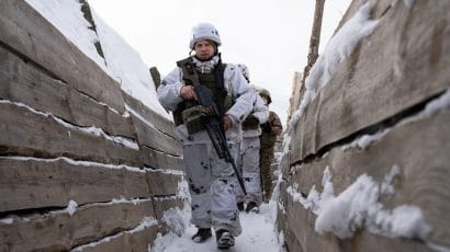 Ukrainian servicemen seen along the frontline outside of Svitlodarsk, Ukraine on January 30. (Photo by Stringer/Anadolu Agency via Getty Images)