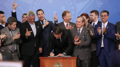 Brazil President Bolsonaro signing decree relaxing gun rules