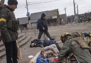 Civilians with their belongings who died trying to escape from Irpin due to Russian attacks. Credit: Міністерство внутрішніх справ України. Accessed via Wikimedia Commons. CC BY 4.0.
