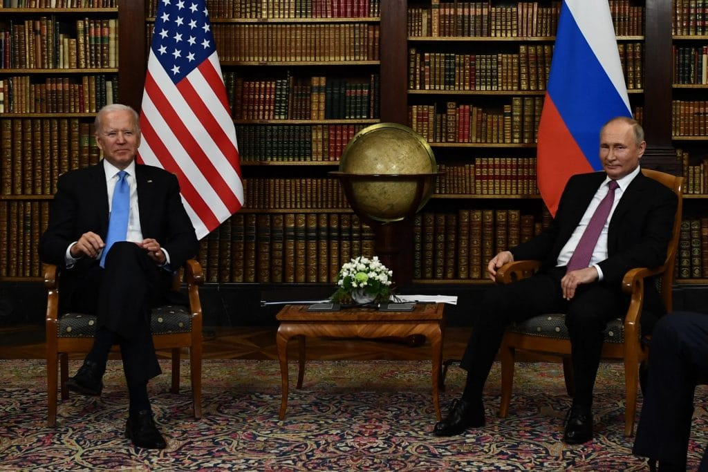 US President Joe Biden (L) and Russian President Vladimir Putin (R) pose for press ahead of the US-Russia summit at the Villa La Grange, in Geneva on June 16, 2021. (Photo by BRENDAN SMIALOWSKI/AFP via Getty Images)