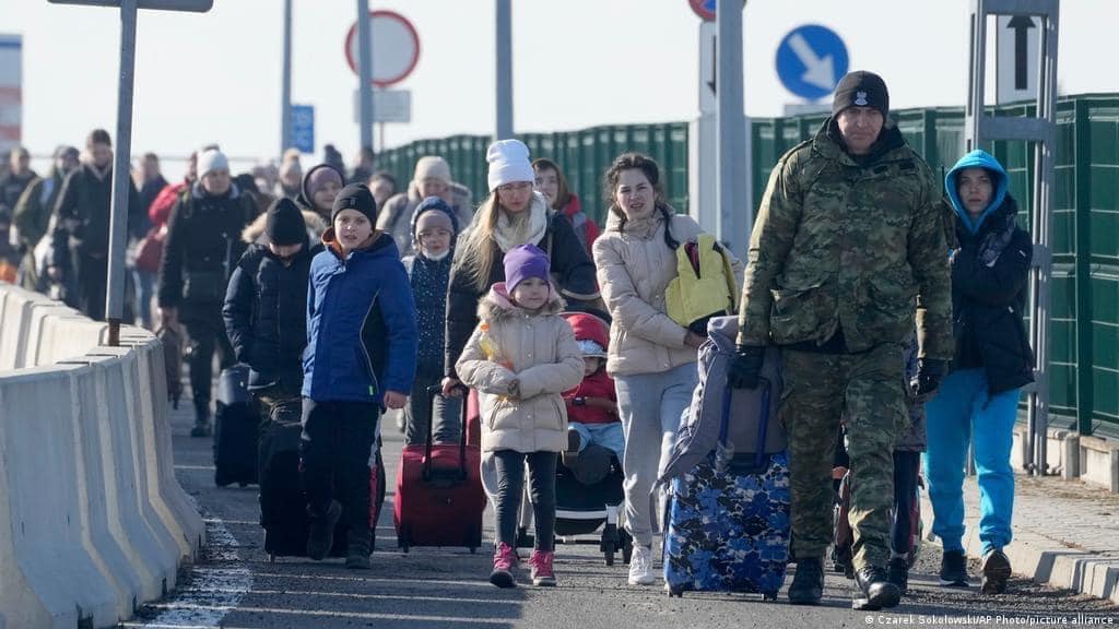 Ukrainian refugees from 2022, crossing into Poland. Credit: Міністерство внутрішніх справ України. Accessed via Wikimedia Commons. CC BY 4.0.