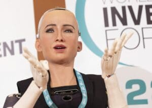 Sophia, a humanoid robot, at the 2018 World Investment Forum. When Sophia was asked whether she would destroy humans, it replied, “Okay, I will destroy humans.” Source: World Investment Forum. Author: UNCTAD. Accessed via Wikimedia Commons. CC BY-SA 2.0.