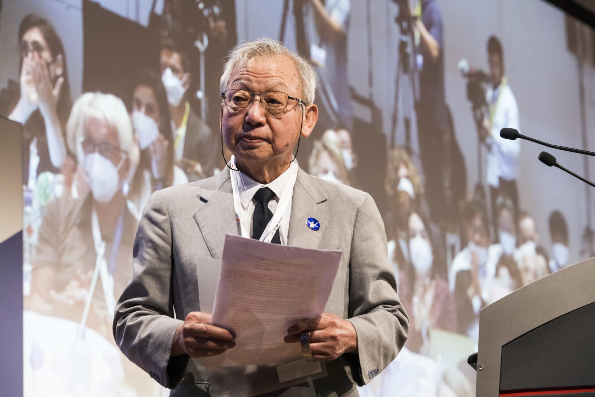 Atomic bomb survivor Sueichi Kido speaking in Vienna
