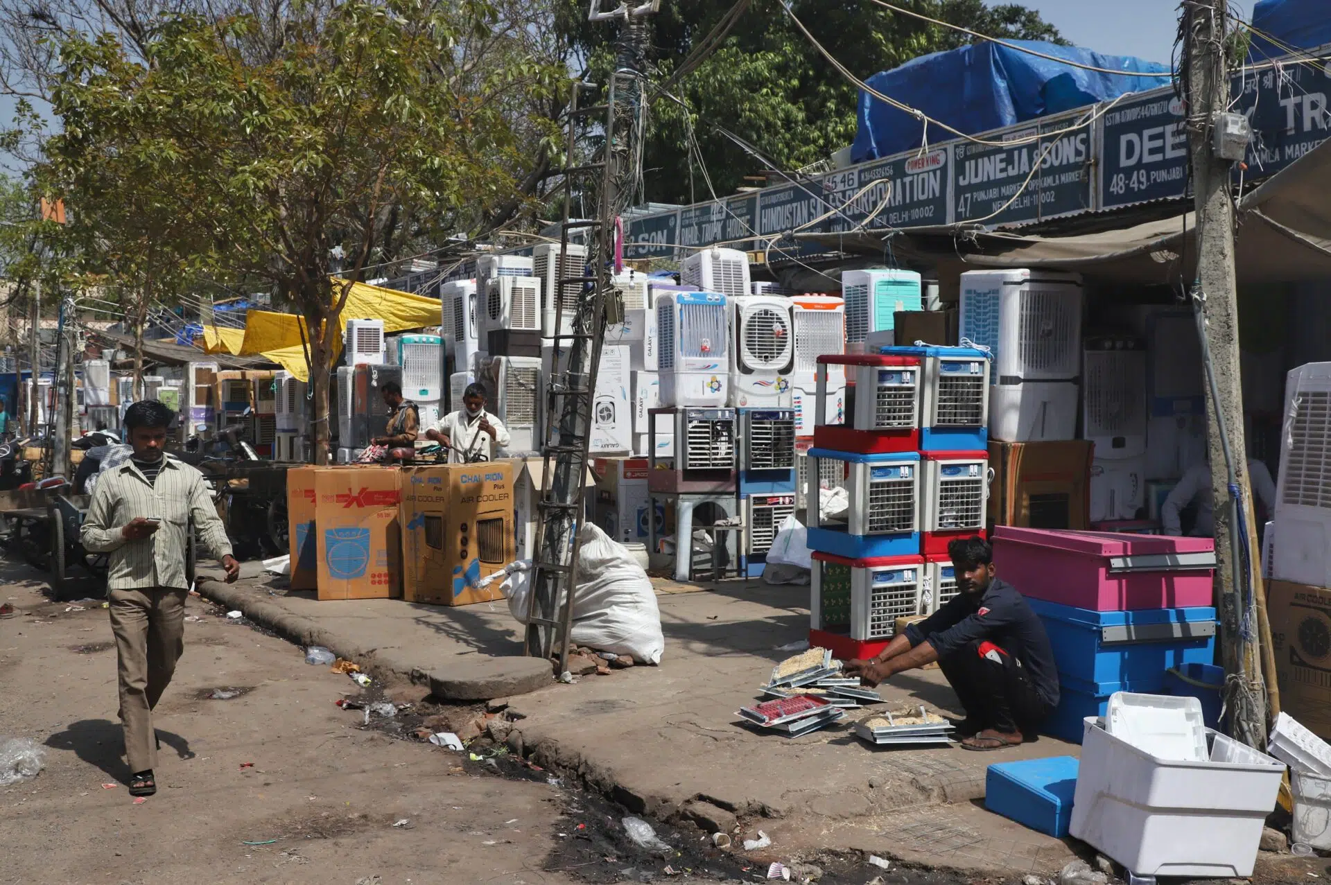 Air conditioning systems for sale outside a shop as temperatures rose in New Delhi on March 14, 2021. (Photo by Nasir Kachroo/NurPhoto via Getty Images)