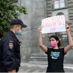 one-woman protest outside old KGB headquarters, Moscow