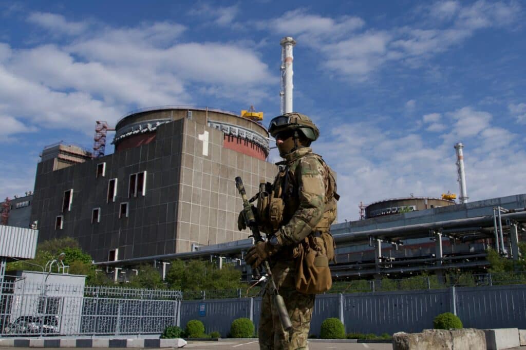 A Russian serviceman patrols the territory of the Zaporizhzhia Nuclear Power Plant on May 1, 2022.